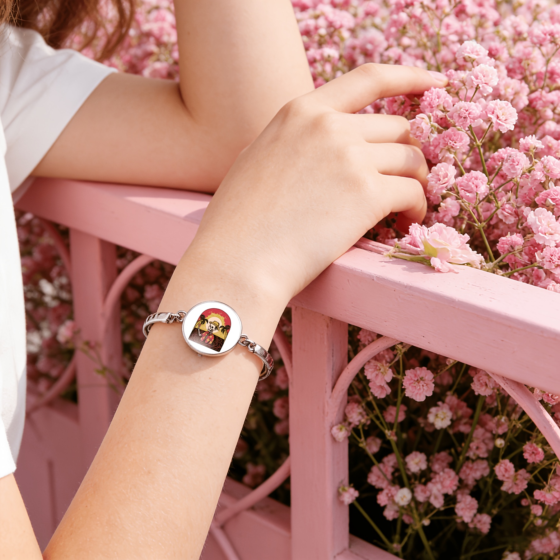 Adjustable Bangle with Skull Design and Gemstone Inlay